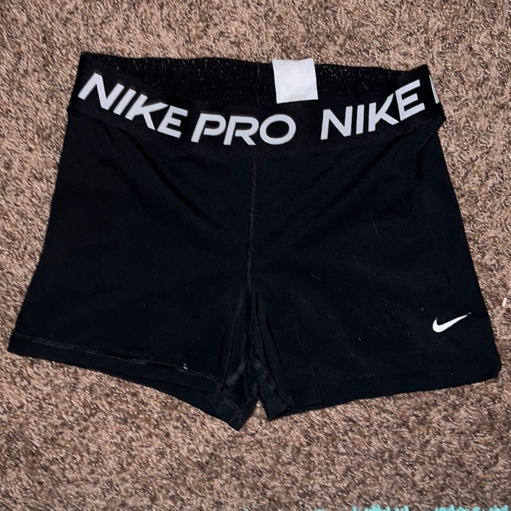 Nike Spanks size Large barely worn small distress on the inside of the waistband
